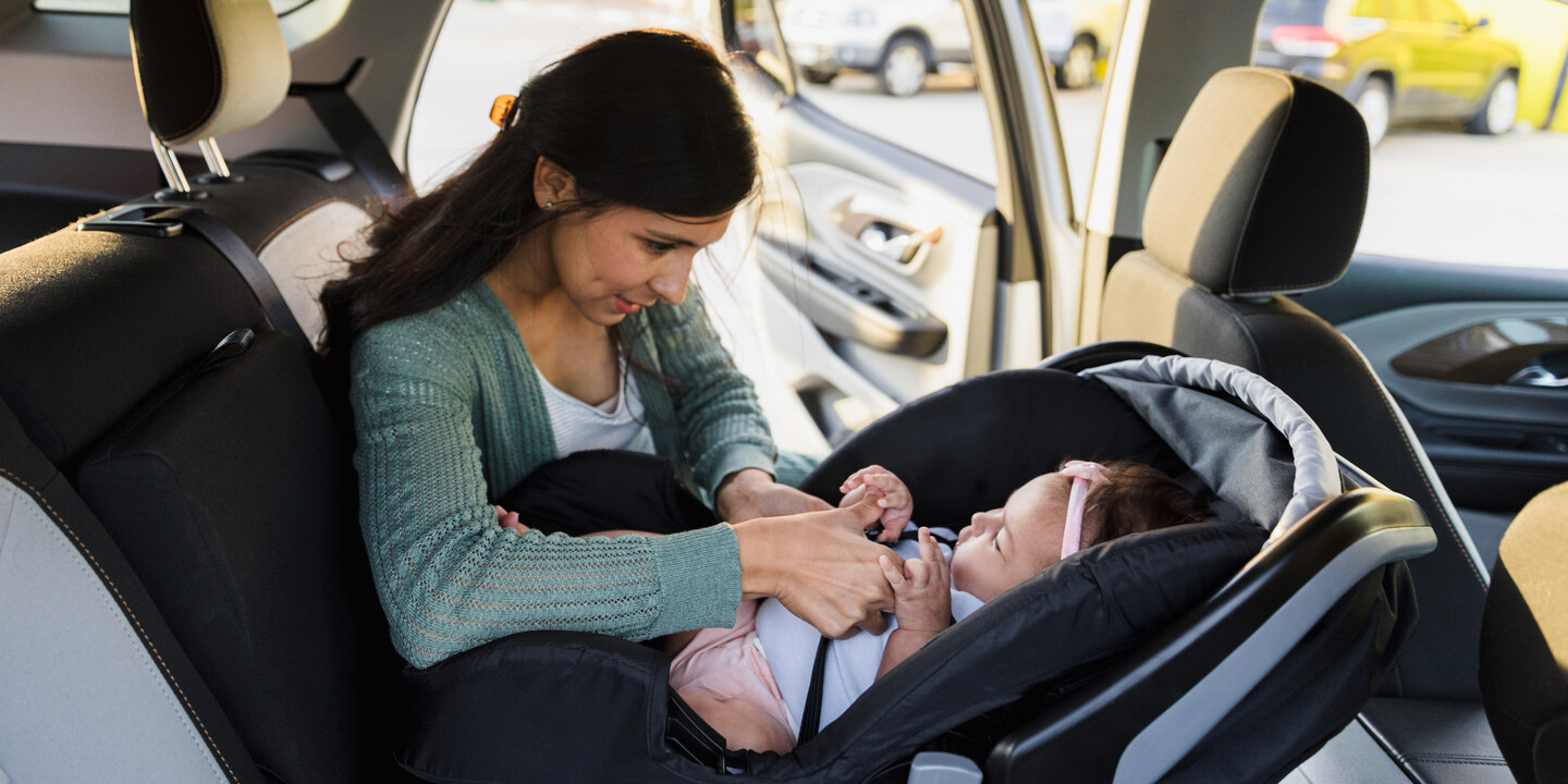 Child car safety seats and 'puffy' coats don't mix